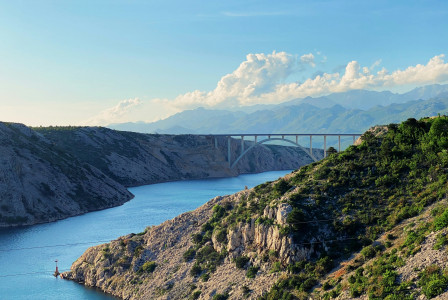 Gray bridge over the river. 