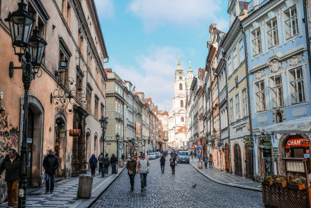 people-walking-on-street-between-buildings-during-daytime