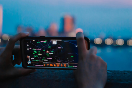 person-holding-black-android-smartphone