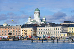 a-large-building-with-a-green-dome-on-top-of-it-
