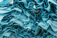 Close-up of blue fabric textured layers.