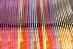 Loom close up with colorful threads