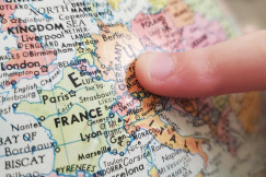 person-holding-white-and-blue-map