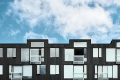 The picture shows an apartment block