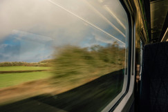 a-blurry-photo-of-a-train-going-by