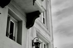 A picture presents a building with a Venice Beach Suites sign.