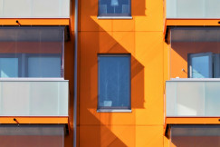 A photo presenting a block of flats.