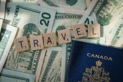A photo of a passport and cash symbolizing travel expenses.