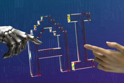 Colour photograph of robot and human hands reaching toward AI text.