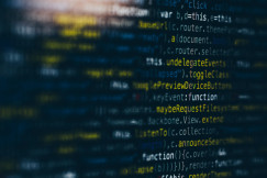 A photo presents computer code displayed on a screen.