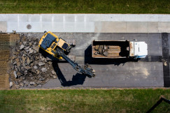 This picture describes road demolition and material recovery activities.