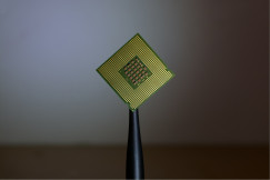 The photo presents a computer processor chip.