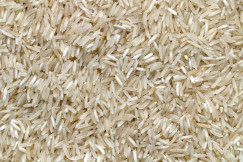 The photo presents a close-up of rice grains.