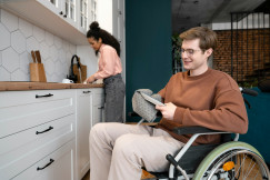 The pictures describe a person using a wheelchair in an accessible home environment.