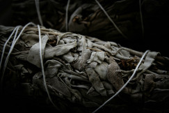 A pile of grey textile scraps and discarded fabric pieces.