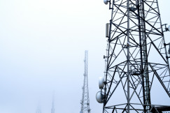 The photo presents telecommunications towers.