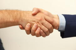 Man and woman holding hands.