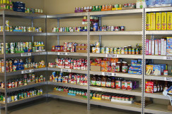 The photo presents shelves filled with food products.