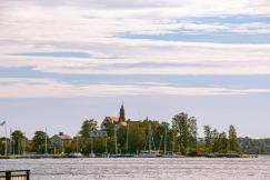 An illustrative photo of a large body of water with boats.