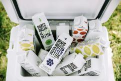 An illustrative photo of a trash bin with cartons