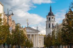 An illustrative photo of a street view with buildings on either side.