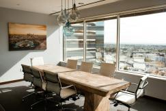 An illustrative photo of beige wooden conference table