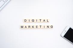An illustrative photo of a laptop and smartphone, digital marketing concept