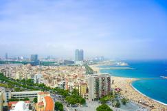 An illustrative photo of a view of high rise buildings and beach