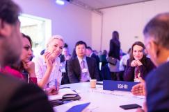 An illustrative photo of people sitting at the table and talking