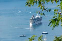 An illustrative photo of a large cruise ship in a body of water.