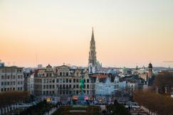 An illustrative photo of a cityscape with a gothic spire in the center