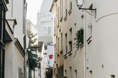 An illustrative photo of a man walking on the streets of Paris