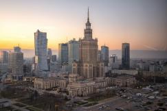 An illustrative photo of a city skyline during day time.