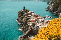 An illustrative photo of white houses on an island in Italy