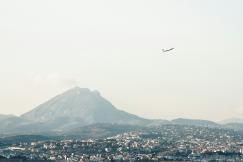 An illustrative photo of mountains near buildings.