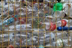 An illustrative photo of bottles in a cage