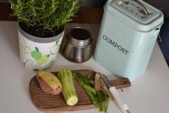 An illustrative photo of cutting vegetables and composting food waste