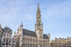 An illustrative photo of big beige fancy buildings
