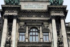 An illustrative photo of a concrete building during daytime 