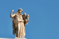 An illustrative photo of a statue of a woman.