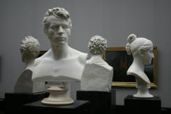 An illustrative photo of head busts of men and women