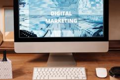 An illustrative photo of a notebook lies open with a business plan schedule, digital marketing concept