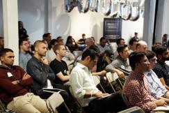 An illustrative photo of people inside white room.