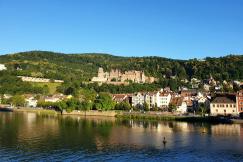 An illustrative photo of a castle on the hill near river