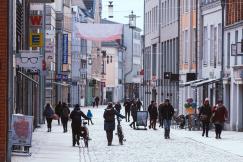 An illustrative photo of a shopping street pedestrian zone.