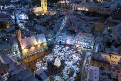 An illustrative photo of an aerial view of a city at night.