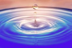 An illustrative photo of a clear water droplet