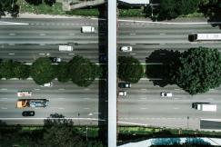An illustrative photo of vehicles traveling on road