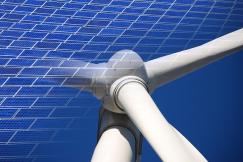 An illustrative photo of a wind turbine and a solar panel