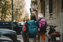 An illustrative photo of people with backpacks.